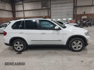 2012 BMW X5 35i z VIN 5UXZV4C54CL748257, wystawiony jako IAAI lot #42036669 z przebiegiem 122 438 mil mil oraz . Historia ofert i sprzedaży dostępna na DreamBid. Obrazek 13.