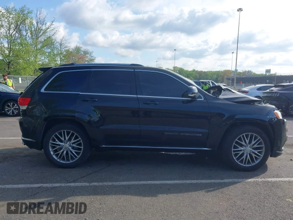 2018 Jeep Grand Cherokee Summit with VIN 1C4RJFJT5JC120523, listed as a IAAI auction lot 42136651 with 75,699 mi miles and . Bid and sale history available at DreamBid. Image 13.