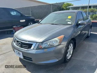 2008 Honda Accord LX z VIN JHMCP26358C033073, wystawiony jako Copart lot #58873205 z przebiegiem 195 692 mil mil oraz Czysty tytuł • Clean title. Historia ofert i sprzedaży dostępna na DreamBid. Obrazek 2.