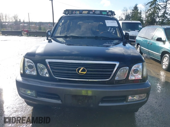 2001 Lexus LX 470 with VIN JTJHT00W613500563, listed as a IAAI auction lot 41730804 with 232,647 mi miles and . Bid and sale history available at carsss.com. Image 12.