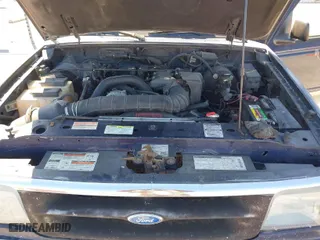 1996 Ford Ranger XL with VIN 1FTCR14U0TPB14713, listed as a IAAI auction lot 41836406 with 154,134 mi miles. Bid and sale history available at carsss.com. Image 10.