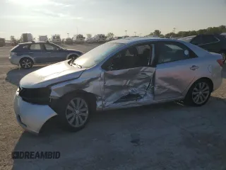 2010 Kia Forte SX с VIN KNAFW4A34A5076525, выставлен на аукционе Copart как лот 74199554 с пробегом Не указан миль и Списание • Salvage title. История ставок и продаж доступна на DreamBid. Изображение 1.