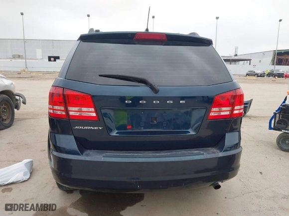 2014 Dodge Journey SE with VIN 3C4PDCAB8ET153272, listed as a IAAI auction lot 41930909 with 189,561 mi miles. Bid and sale history available at carsss.com. Image 17.