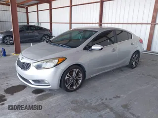 2016 Kia Forte EX with VIN KNAFX4A81G5528190, listed as a IAAI auction lot 42142075 with 162,056 mi miles. Bid and sale history available at carsss.com. Image 2.