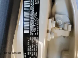 2021 Maserati Levante z VIN ZN661XUA1MX370792, wystawiony jako Copart lot #83474194 z przebiegiem 89 428 mil mil oraz Szkoda całkowita • Salvage title. Historia ofert i sprzedaży dostępna na DreamBid. Obrazek 14.