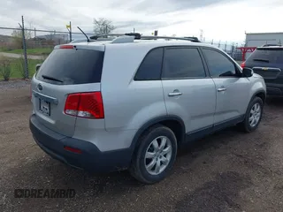 2012 Kia Sorento LX with VIN 5XYKT4A61CG215217, listed as a IAAI auction lot 42103645 with 200,758 mi miles. Bid and sale history available at carsss.com. Image 4.