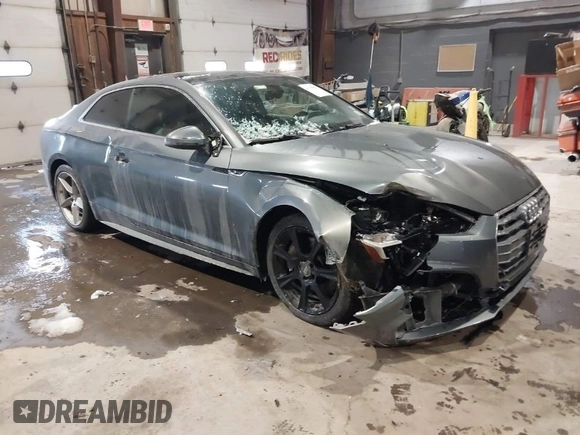 2018 Audi A5 Premium Plus with VIN WAUTNAF50JA011354, listed as a IAAI auction lot 41396659 with 74,936 mi miles and . Bid and sale history available at DreamBid. Image 1.