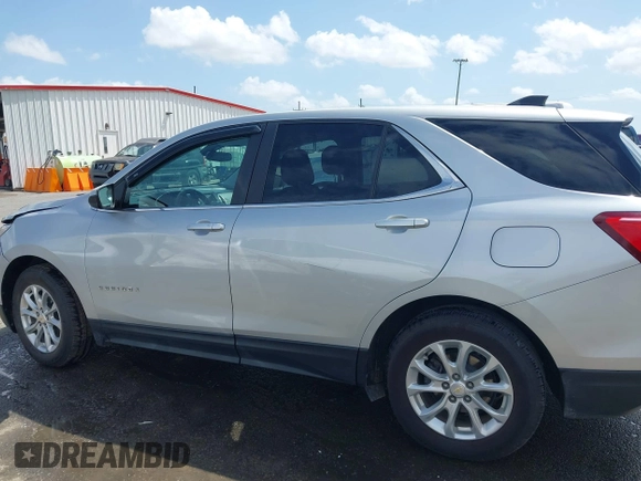 2021 Chevrolet Equinox LT with VIN 2GNAXKEV3M6129404, listed as a IAAI auction lot 41779923 with 113,615 mi miles and . Bid and sale history available at DreamBid. Image 14.