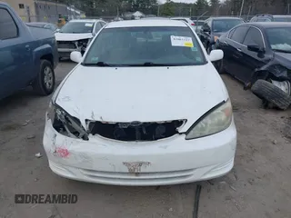 2003 Toyota Camry LE z VIN 4T1BE32K33U219697, wystawiony jako IAAI lot #42003327 z przebiegiem 217 500 mil mil oraz . Historia ofert i sprzedaży dostępna na DreamBid. Obrazek 12.