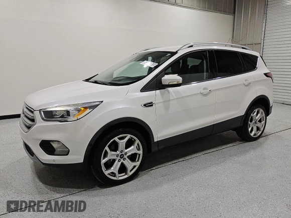 2018 Ford Escape Titanium with VIN 1FMCU9J90JUC67390, listed as a Copart auction lot 64271865 with 79,921 mi miles and Clean title. Bid and sale history available at DreamBid. Image 1.