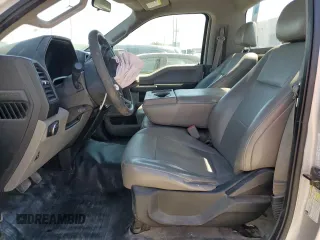 2016 Ford F-150 XL with VIN 1FTMF1C86GKD33700, listed as a Copart auction lot 48743235 with 104,561 mi miles and Salvage title. Bid and sale history available at DreamBid. Image 7.