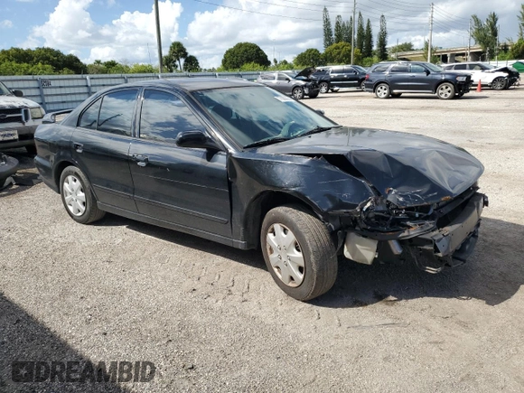 2002 Mitsubishi Galant with VIN 4A3AA36G12E165484, listed as a Copart auction lot 77563634 with 189,776 mi miles and Salvage Title. Bid and sale history available at DreamBid. Image 4.