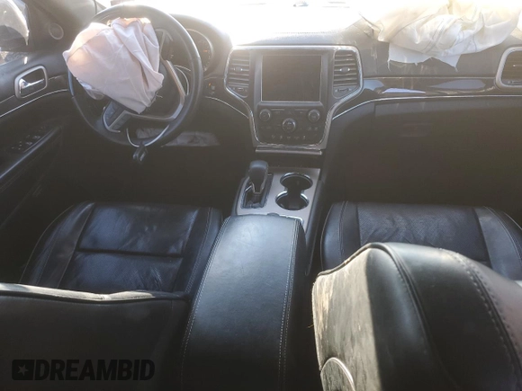 2017 Jeep Grand Cherokee Overland with VIN 1C4RJFCG1HC778818, listed as a Copart auction lot 87368764 with 62,471 mi miles and Salvage Title. Bid and sale history available at carsss.com. Image 8.