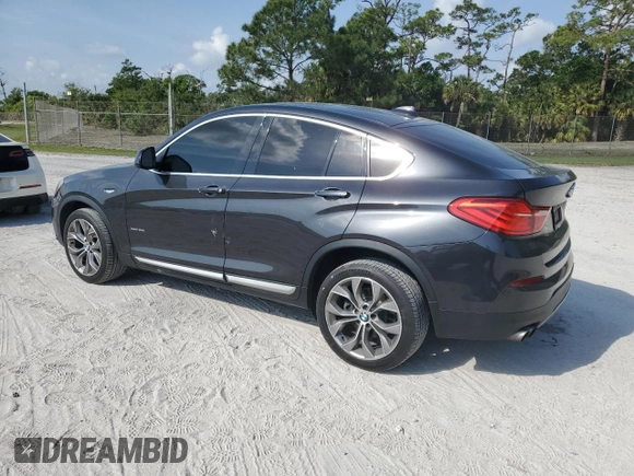 2017 BMW X4 xDrive28i with VIN 5UXXW3C36H0T79956, listed as a Copart auction lot 50156445 with 100,226 mi miles and Salvage title. Bid and sale history available at DreamBid. Image 2.