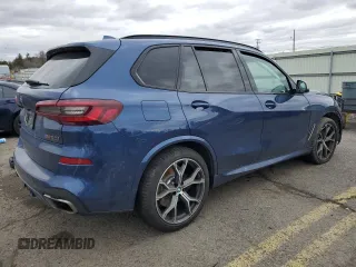 2021 BMW X5 M50i with VIN 5UXJU4C03M9E52555, listed as a Copart auction lot 48171365 with 64,731 mi miles and Salvage Title. Bid and sale history available at carsss.com. Image 3.
