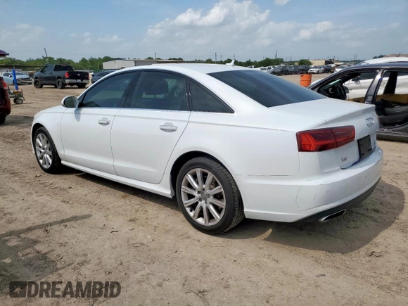 2016 Audi A6 Premium Plus with VIN WAUGFAFC9GN027566, listed as a Copart auction lot 64305925 with 74,445 mi miles and Salvage title. Bid and sale history available at DreamBid. Image 2.