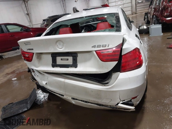 2015 BMW 4 Series 428i xDrive z VIN WBA3N9C52FK246245, wystawiony jako IAAI lot #41650714 z przebiegiem 142 776 mil mil oraz . Historia ofert i sprzedaży dostępna na DreamBid. Obrazek 17.