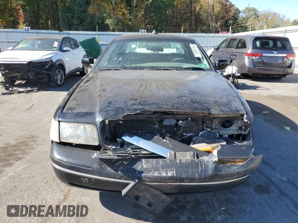 2001 Ford Crown Victoria Police Interceptor z VIN 2FAFP71W41X205475, wystawiony jako Copart lot #75265194 z przebiegiem 117 633 mil mil oraz Szkoda całkowita • Salvage title. Historia ofert i sprzedaży dostępna na DreamBid. Obrazek 5.