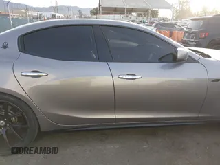 2015 Maserati Ghibli S Q4 z VIN ZAM57RTA8F1144095, wystawiony jako IAAI lot #41392848 z przebiegiem 52 237 mil mil oraz . Historia ofert i sprzedaży dostępna na DreamBid. Obrazek 14.