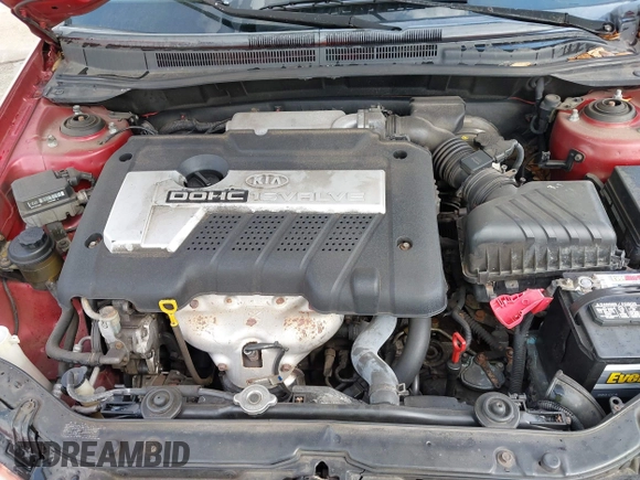 2004 Kia Spectra LX with VIN KNAFE121545021648, listed as a IAAI auction lot 41842471 with 211,436 mi miles. Bid and sale history available at carsss.com. Image 10.
