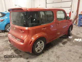 2009 Nissan Cube SL z VIN JN8AZ28R29T119001, wystawiony jako IAAI lot #41583215 z przebiegiem 203 906 mil mil oraz . Historia ofert i sprzedaży dostępna na DreamBid. Obrazek 4.