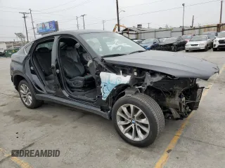 2019 BMW X6 xDrive50i with VIN 5UXKU6C52KLP60521, listed as a Copart auction lot 76317864 with 15,243 mi miles and Clean Title. Bid and sale history available at carsss.com. Image 4.