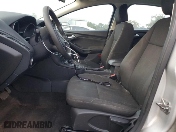 2017 Ford Focus SE with VIN 1FADP3F28HL315779, listed as a Copart auction lot 82608154 with 143,902 mi miles and Salvage title. Bid and sale history available at DreamBid. Image 7.