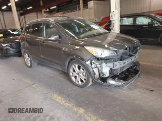 2015 Ford Escape Titanium с VIN 1FMCU9J98FUC05727, выставлен на аукционе IAAI как лот 42229328 с пробегом 112 896 миль миль и . История ставок и продаж доступна на DreamBid. Изображение 1.