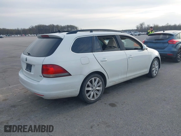 2014 Volkswagen Jetta TDI w/Sunroof & Nav with VIN 3VWPL7AJ7EM617385, listed as a IAAI auction lot 42012881 with 98,015 mi miles and . Bid and sale history available at DreamBid. Image 4.