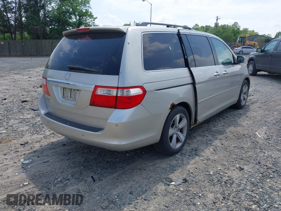 2006 Honda Odyssey Touring z VIN 5FNRL38816B012601, wystawiony jako IAAI lot #42148571 z przebiegiem 278 590 mil mil oraz . Historia ofert i sprzedaży dostępna na DreamBid. Obrazek 4.