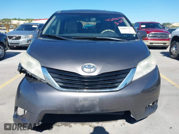 2014 Toyota Sienna LE AAS with VIN 5TDKK3DC8ES457023, listed as a IAAI auction lot 42067713 with 335,130 mi miles. Bid and sale history available at carsss.com. Image 13.