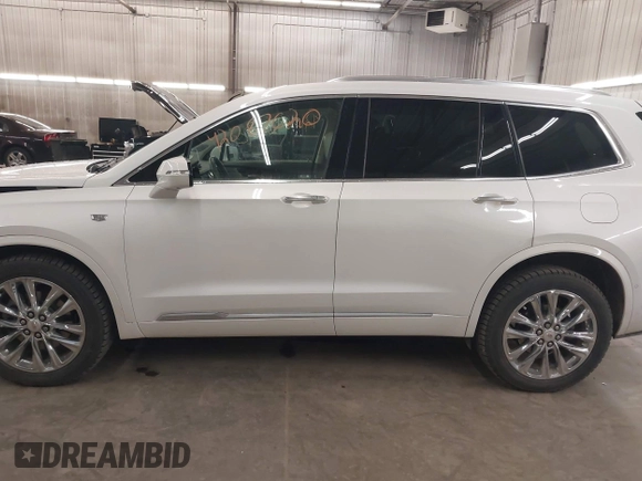 2022 Cadillac XT6 Premium Luxury with VIN 1GYKPDRS3NZ131095, listed as a IAAI auction lot 42087620 with 36,740 mi miles and . Bid and sale history available at DreamBid. Image 15.