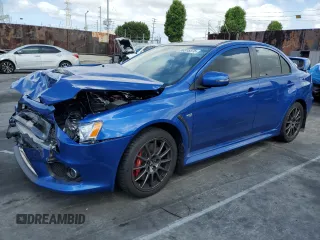 2015 Mitsubishi Lancer Evolution Final Edition z VIN JA32W7FV3FU028586, wystawiony jako Copart lot #56315375 z przebiegiem 28 351 mil mil oraz Szkody całkowita. Historia ofert i sprzedaży dostępna na DreamBid. Obrazek 1.