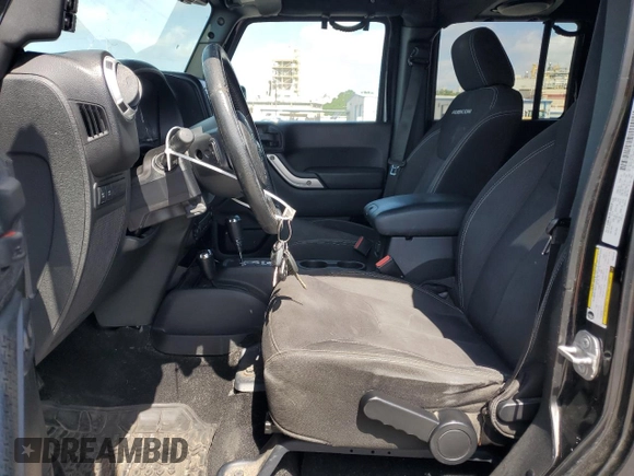 2014 Jeep Wrangler Unlimited Rubicon with VIN 1C4BJWFGXEL292145, listed as a Copart auction lot 53543485 with 121,884 mi miles and Clean Title. Bid and sale history available at carsss.com. Image 7.
