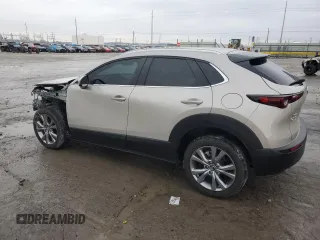 2023 Mazda CX-30 S Carbon Edition with VIN 3MVDMBCM5PM585339, listed as a Copart auction lot 43573935 with 12,676 mi miles and Salvage Title. Bid and sale history available at DreamBid. Image 2.
