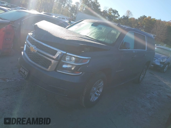 2019 Chevrolet Suburban LT with VIN 1GNSCHKC9KR327072, listed as a IAAI auction lot 40852032 with 109,815 mi miles and . Bid and sale history available at DreamBid. Image 2.