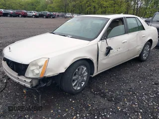 2010 Cadillac DTS 1SD z VIN 1G6KH5EYXAU121435, wystawiony jako IAAI lot #42175287 z przebiegiem Nie podano mil oraz . Historia ofert i sprzedaży dostępna na DreamBid. Obrazek 2.