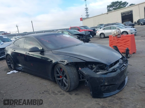 2022 Tesla Model S Plaid with VIN 5YJSA1E6XNF460235, listed as a IAAI auction lot 40951359 with 18,922 mi miles and . Bid and sale history available at DreamBid. Image 1.