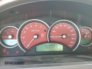 2006 Pontiac GTO z VIN 6G2VX12U86L519612, wystawiony jako Copart lot #73336964 z przebiegiem 122 003 mil mil oraz Szkody całkowita. Historia ofert i sprzedaży dostępna na DreamBid. Obrazek 9.