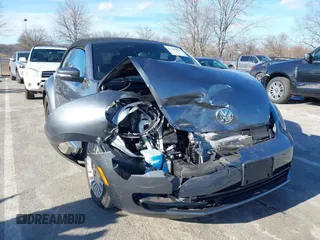 2015 Volkswagen Beetle S with VIN 3VW517AT5FM816046, listed as a IAAI auction lot 41441825 with 58,989 mi miles and . Bid and sale history available at DreamBid. Image 1.