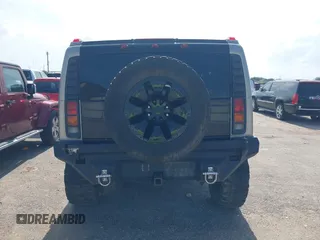 2004 Hummer H2 z VIN 5GRGN23U34H105809, wystawiony jako IAAI lot #42456055 z przebiegiem Nie podano mil oraz . Historia ofert i sprzedaży dostępna na DreamBid. Obrazek 16.