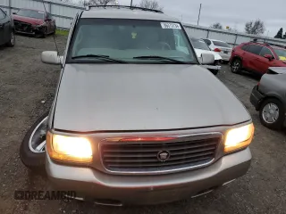 2000 Cadillac Escalade z VIN 1GYEK63R5YR219759, wystawiony jako Copart lot #86373734 z przebiegiem 190 307 mil mil oraz Szkoda całkowita • Salvage title. Historia ofert i sprzedaży dostępna na DreamBid. Obrazek 5.