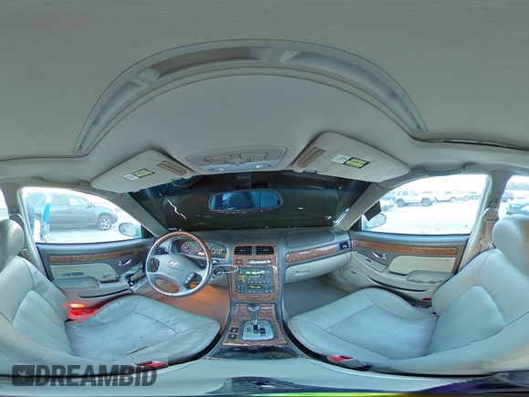 2005 Hyundai XG z VIN KMHFU45E15A377458, wystawiony jako Copart lot #78931844 z przebiegiem 230 852 mil mil oraz Szkoda całkowita • Salvage title. Historia ofert i sprzedaży dostępna na DreamBid. Obrazek 13.