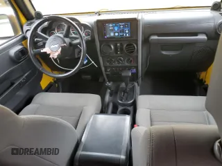 2009 Jeep Wrangler Unlimited Rubicon with VIN 1J8GA69109L761089, listed as a Copart auction lot 57975985 with 195,530 mi miles and Salvage title. Bid and sale history available at DreamBid. Image 8.