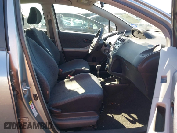 2010 Toyota Yaris with VIN JTDKT4K38A5285260, listed as a IAAI auction lot 41476373 with 104,358 mi miles. Bid and sale history available at carsss.com. Image 5.