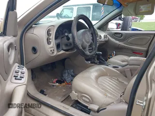 2005 Pontiac Bonneville SE z VIN 1G2HX52K95U210921, wystawiony jako IAAI lot #42156734 z przebiegiem Nie podano mil oraz . Historia ofert i sprzedaży dostępna na DreamBid. Obrazek 5.