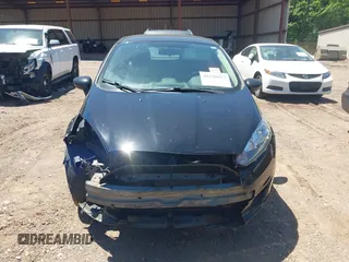 2019 Ford Fiesta SE z VIN 3FADP4EJ0KM125724, wystawiony jako IAAI lot #42320657 z przebiegiem 53 728 mil mil oraz . Historia ofert i sprzedaży dostępna na DreamBid. Obrazek 13.