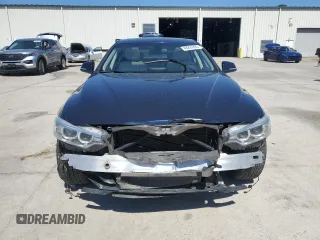 2015 BMW 4 Series 428i with VIN WBA4A5C53FGK15503, listed as a Copart auction lot 49297895 with 125,055 mi miles and Salvage title. Bid and sale history available at DreamBid. Image 5.