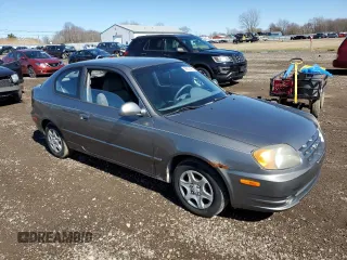 2005 Hyundai Accent GLS with VIN KMHCG35C65U331867, listed as a Copart auction lot 49637495 with 63,901 mi miles and Clean Title. Bid and sale history available at carsss.com. Image 4.