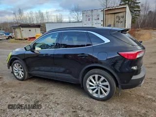 2021 Ford Escape Titanium Hybrid с VIN 1FMCU9DZ1MUA60443, выставлен на аукционе Copart как лот 80559254 с пробегом 30 968 миль миль и Списание • Salvage title. История ставок и продаж доступна на DreamBid. Изображение 2.